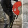 Construction worker cut a wall using CARDI PE 401 diamond blade saw.